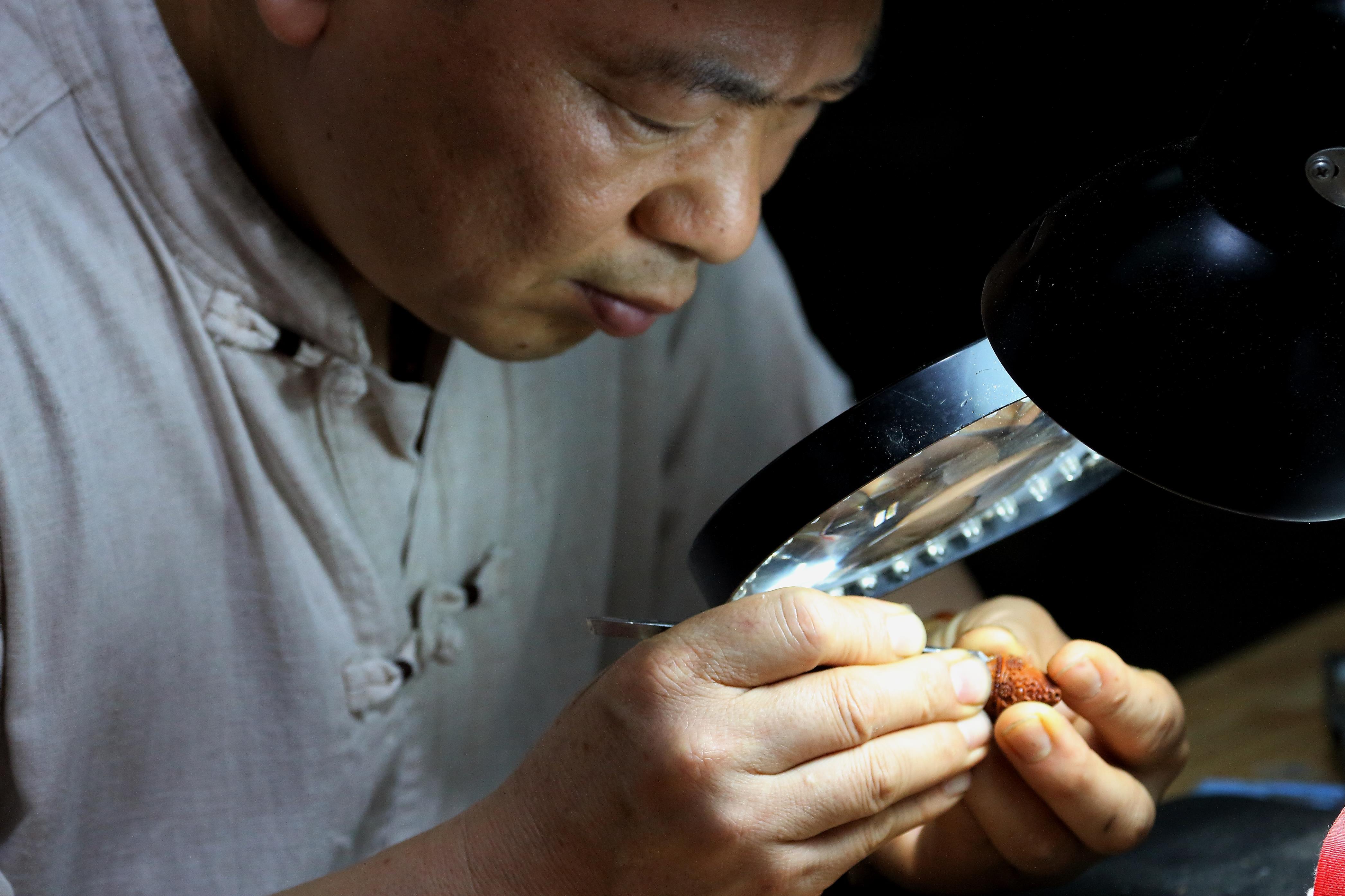 Olive pit carving.jpg